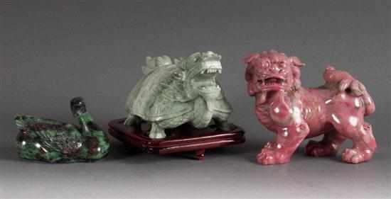 Appraisal: Chinese carved hardstone fanciful animal figure and similar foo dog