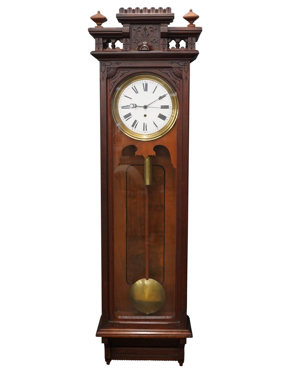 Appraisal: EASTLAKE MAHOGANY WALL CLOCKunsigned with pendulum and one weight inches