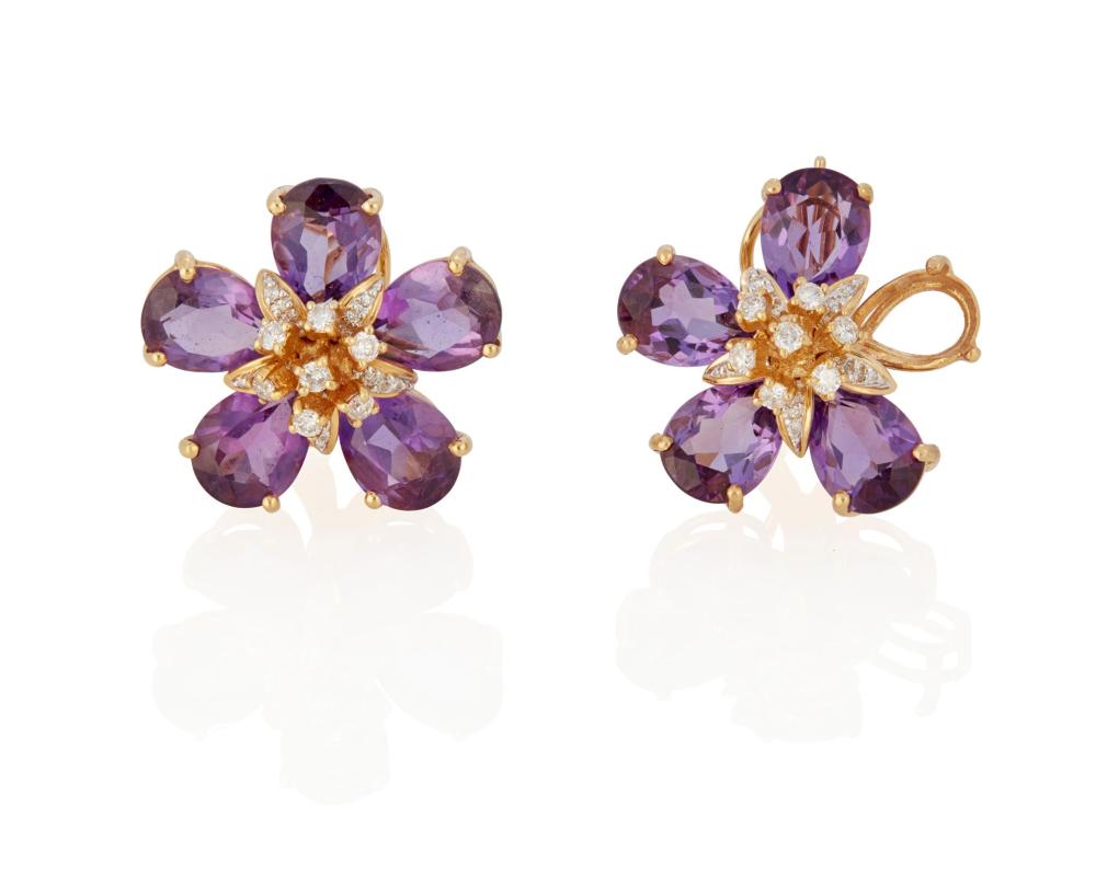 Appraisal: A PAIR OF AMETHYST AND DIAMOND FLOWER EAR CLIPSA pair