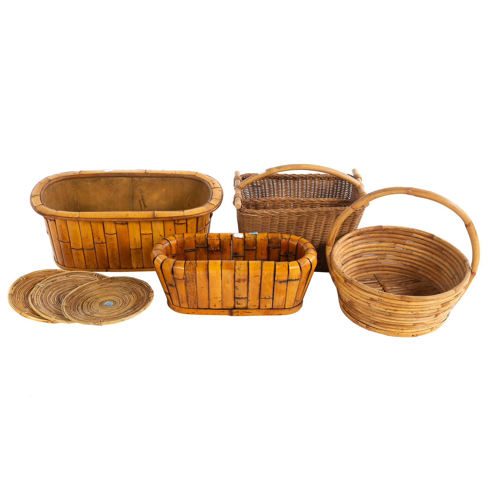 Appraisal: SEVEN ASSORTED RATTAN WICKER ARTICLES Including handled basket three circular