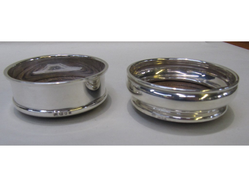 Appraisal: Lot comprising two silver coasters London cm dia cm dia