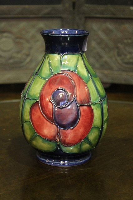 Appraisal: A MOORCROFT ROSE VASE designed by Sally Tuffin cm high