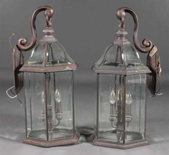 Appraisal: Pair of Georgian style weathered metal and beveled glass wall