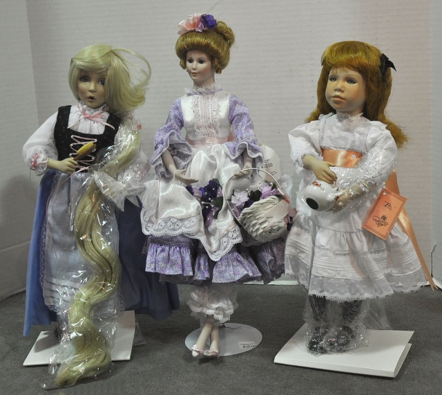 Appraisal: Three Artist Porcelain DollsIncluding Polly by Susan Krey Flower Maide