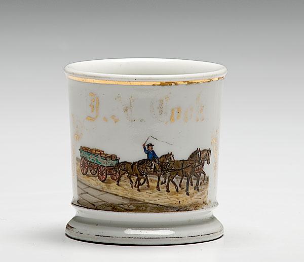 Appraisal: UNUSUAL TEAMSTER'S OCCUPATIONAL SHAVING MUG porcelain with polychrome painted scene