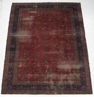 Appraisal: Sarouk Carpet floral designs on burgundy ground olive green and