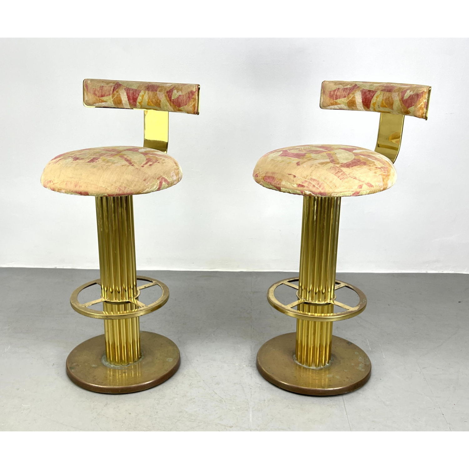 Appraisal: Pair Designs for Leisure L T D Brass Bar Stools