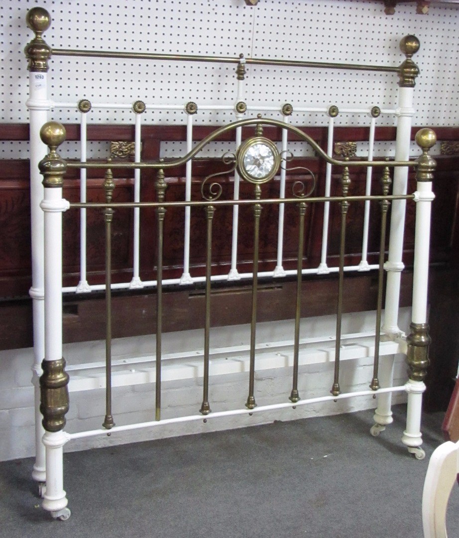 Appraisal: An early th century white painted and brass double bed