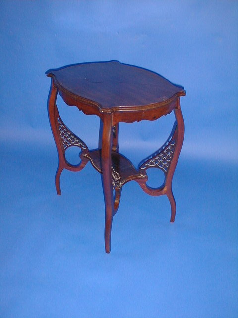 Appraisal: A late Victorian mahogany window table with under shelf