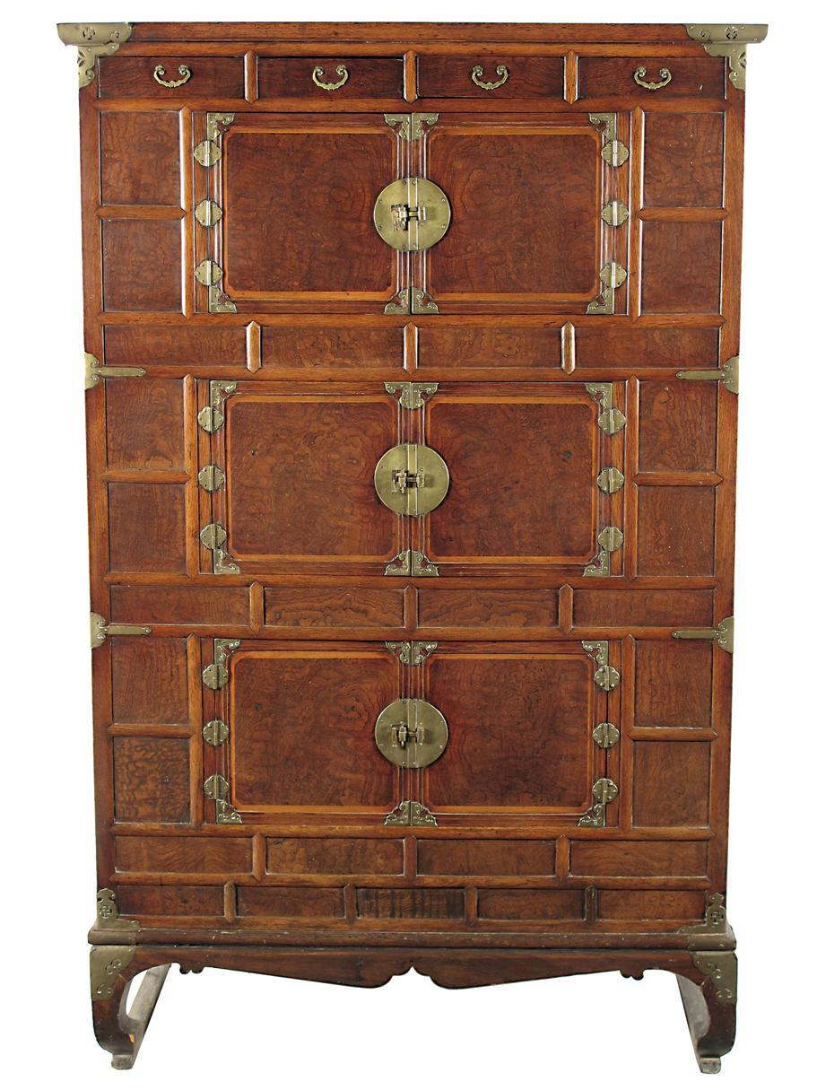 Appraisal: A Korean burr veneered and brass bound cabinet