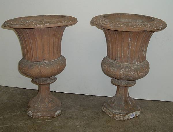 Appraisal: A pair of terracotta campana form urns second half th