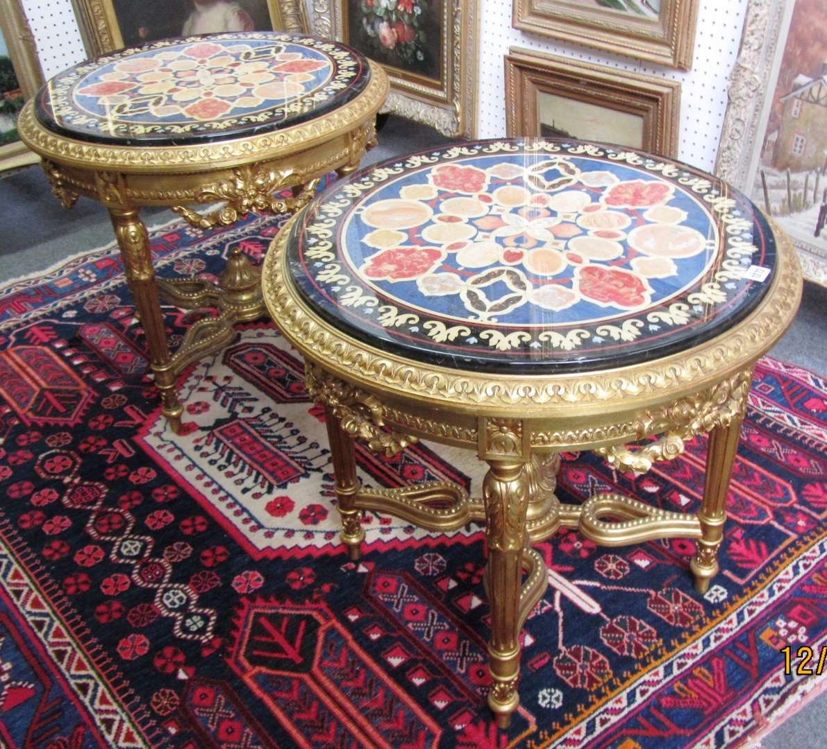 Appraisal: A pair of th century faux marble top circular occasional