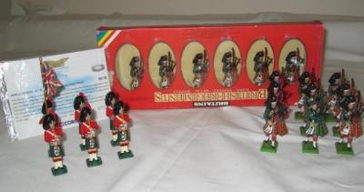 Appraisal: Britains six Scots Guard Pipers boxed nine other pipers and