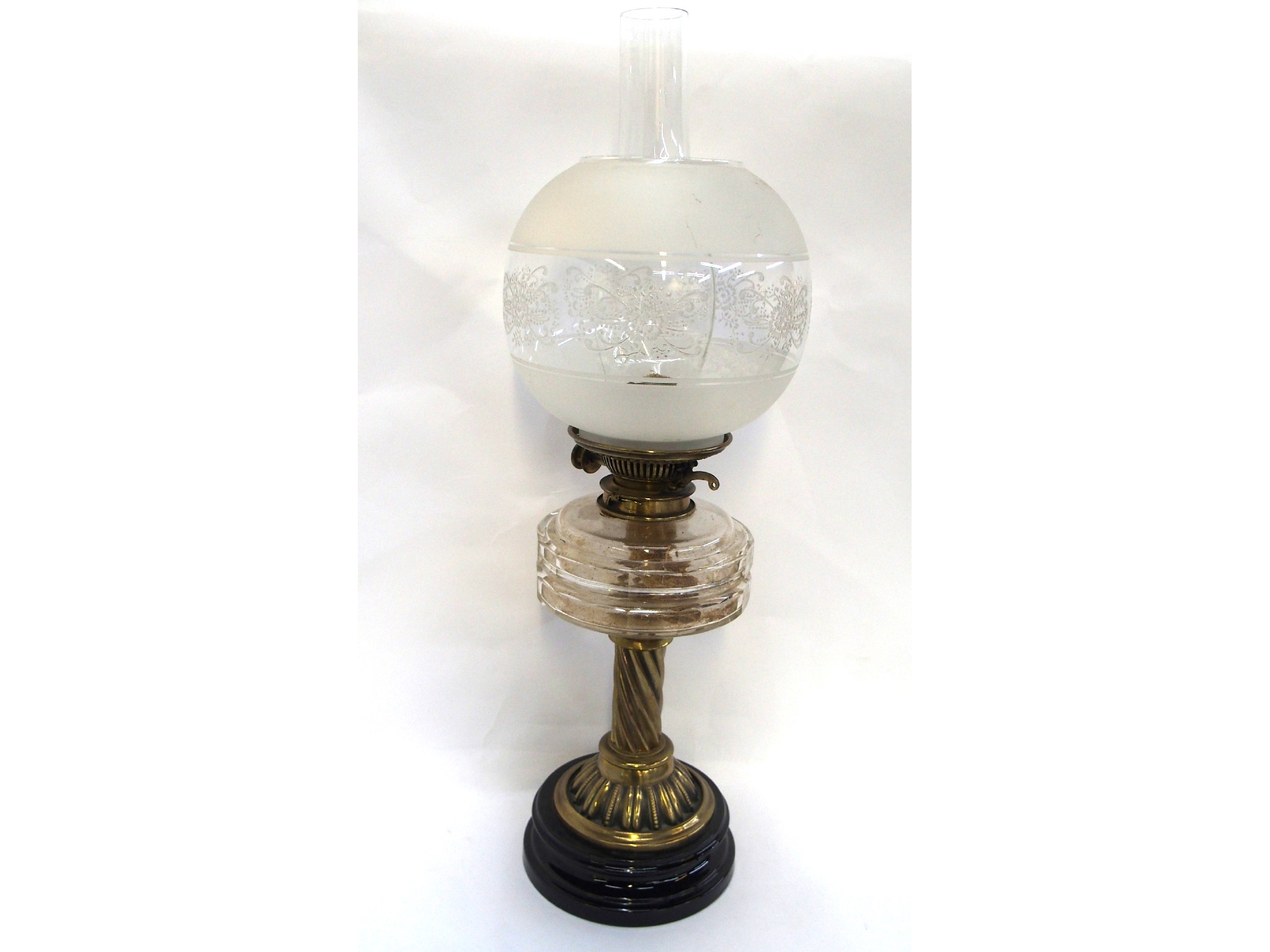 Appraisal: Victorian oil lamp with twisted brass column and clear glass