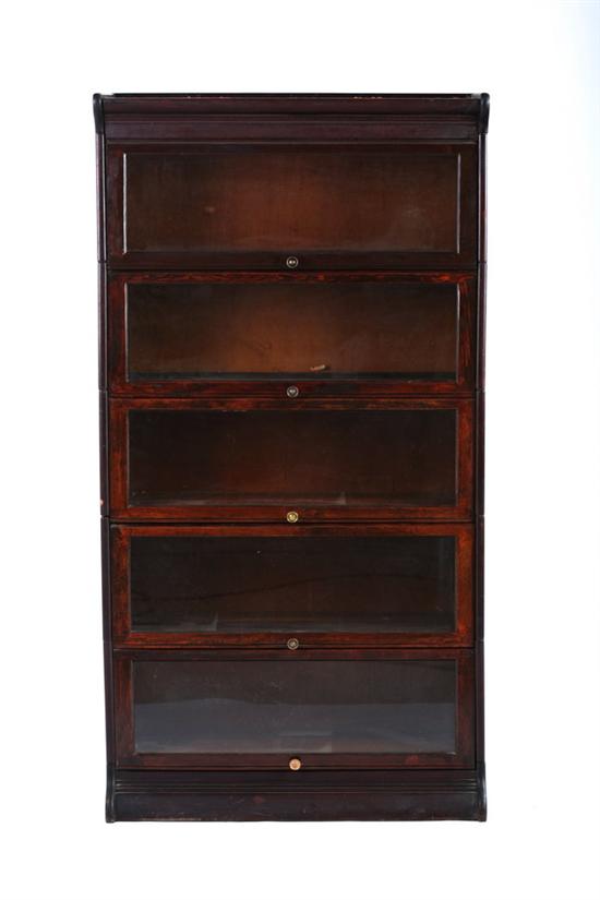 Appraisal: FIVE TIER BARRISTER BOOKCASE Early th century Molded crest give