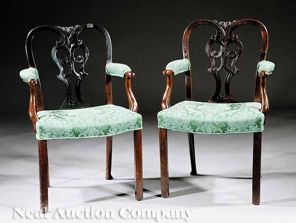 Appraisal: A Pair of Antique Georgian-Style Carved Mahogany Armchairs arched foliate