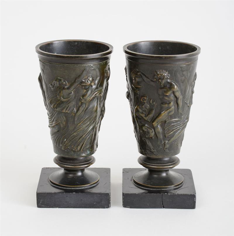 Appraisal: PAIR OF CLASSICAL ROMAN STYLE RELIEF BRONZE CUPS Each with