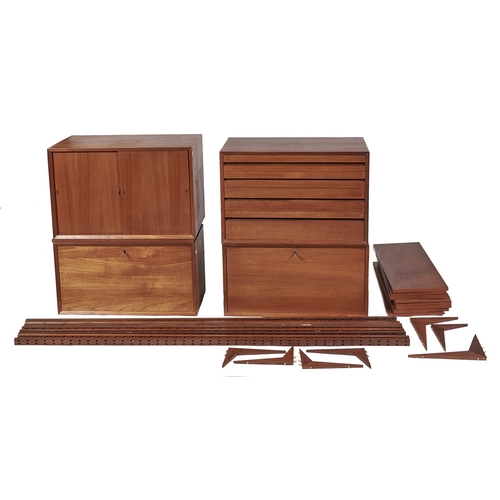 Appraisal: A teak modular wall unit s in several sections with