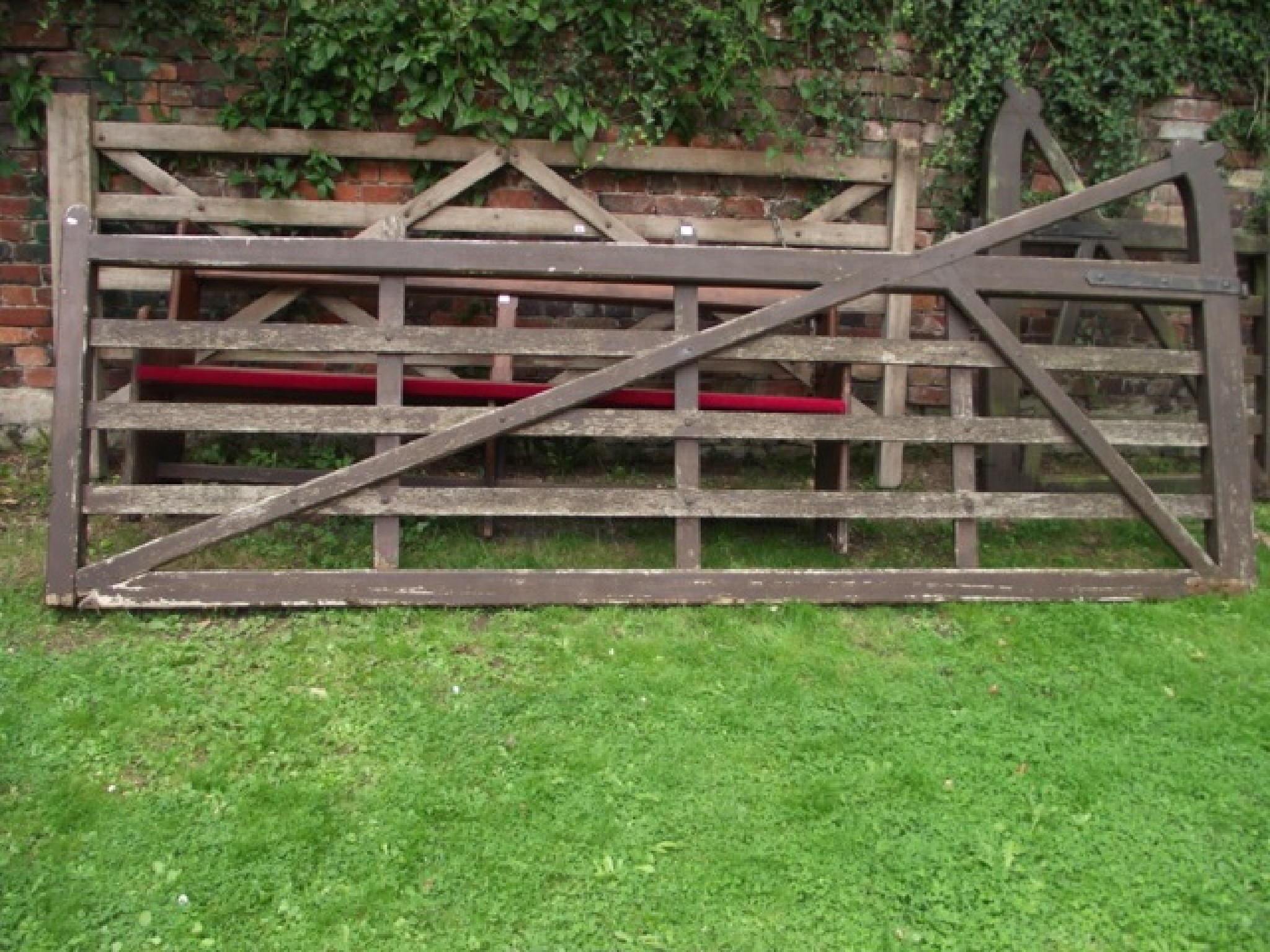 Appraisal: A reclaimed weathered wooden five bar field driveway gate with