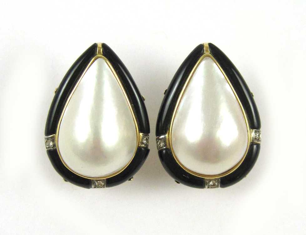 Appraisal: PAIR OF MABE' PEARL AND BLACK ONYX EARRINGS each k