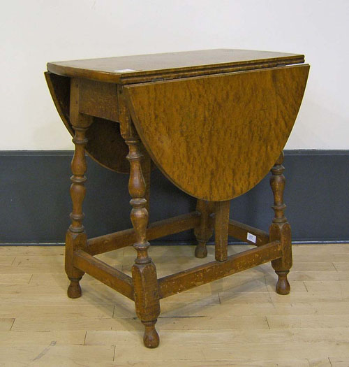 Appraisal: Maple butterfly table th c h w d