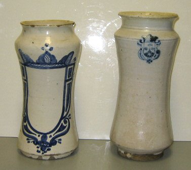 Appraisal: TWO EARTHENWARE APOTHECARY JARS Each of waisted shape and blue