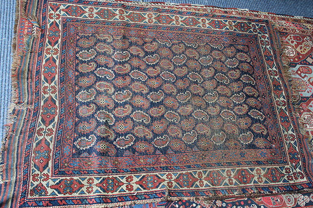 Appraisal: AN OLD AFSHAR BLUE GROUND RUG with geometric design to