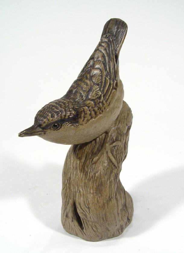 Appraisal: Poole pottery Barbara Lynley Adams bird on a tree stump