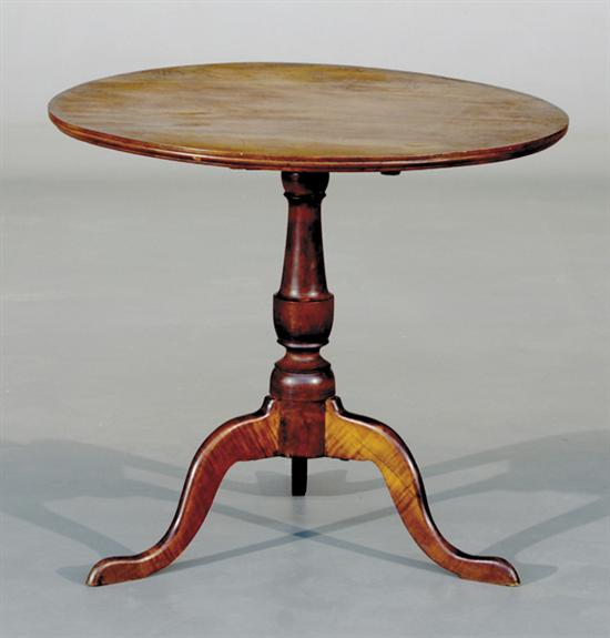 Appraisal: American cherry tilt-top table th centuryround top supported by baluster