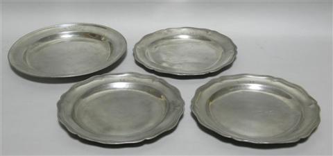 Appraisal: GROUP OF FOUR PEWTER DISHES Including a crested charger -