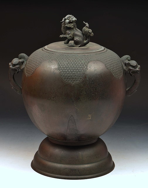 Appraisal: Large Japanese bronze ovoid vase and coverkylin finial and elephant