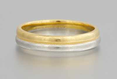 Appraisal: A Platinum and k Yellow Gold Band Signed Diana Fused