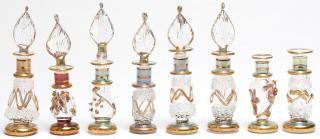 Appraisal: Egyptian Glass Perfume Bottles Each with applied gold-tone glaze in