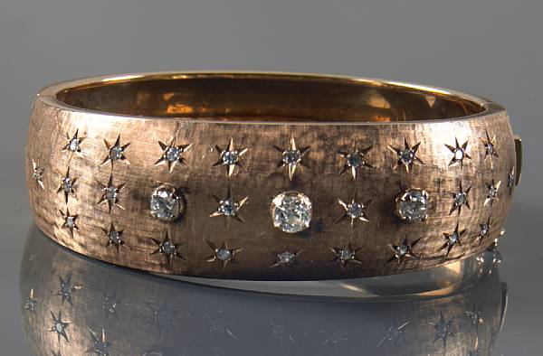 Appraisal: A k gold and diamond bangle estimated total diamond weight