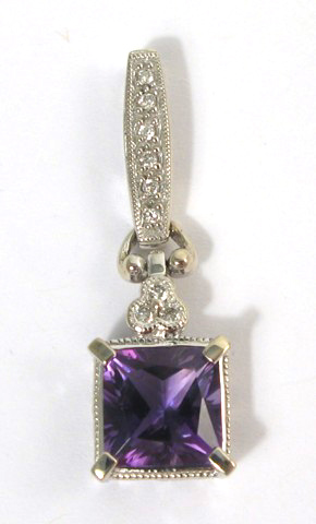 Appraisal: AMETHYST AND DIAMOND PENDANT k white gold set with a