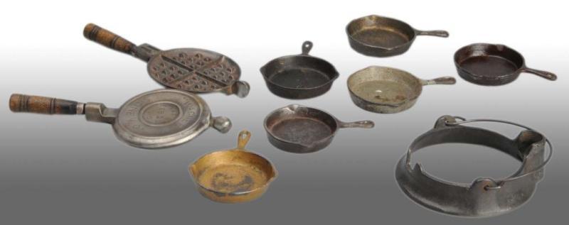 Appraisal: Lot of Cast Iron Children's Stove Accessories Description Includes six