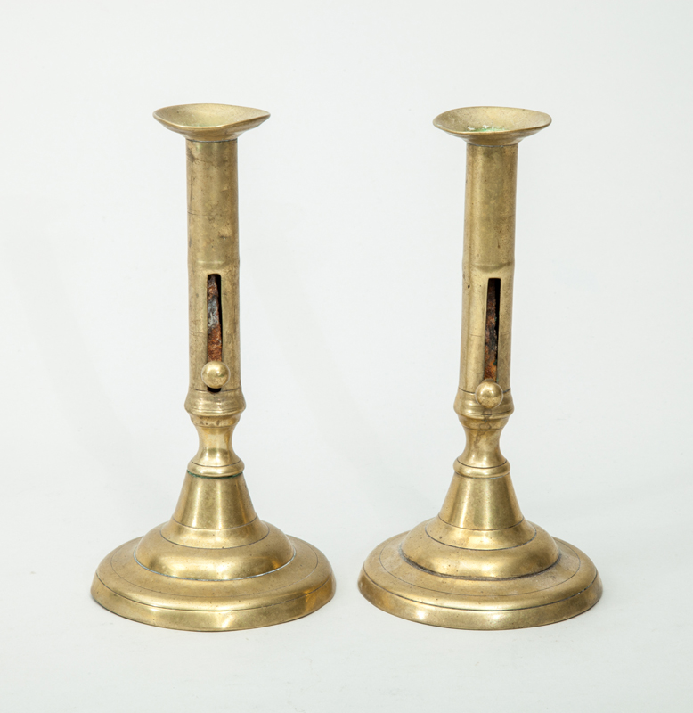 Appraisal: PAIR OF GEORGE III BRASS PUSH-UP CANDLESTICKS x in diam