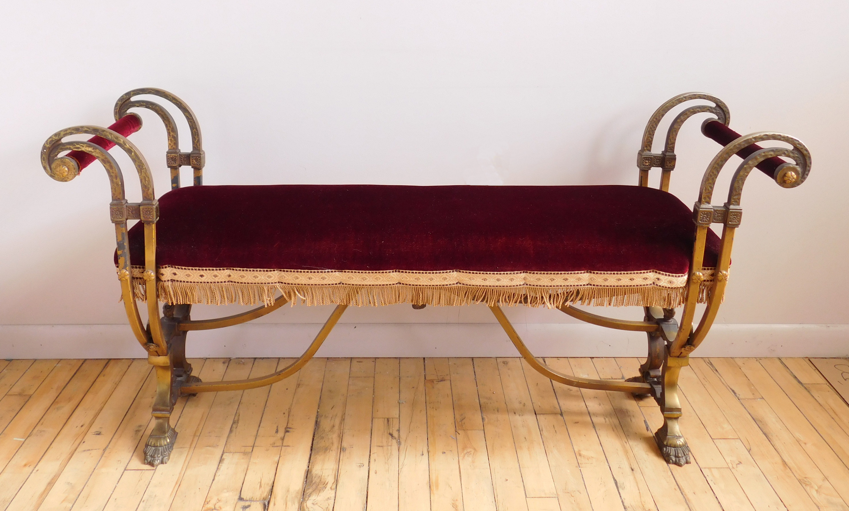 Appraisal: Wrought iron hall bench with red velvet upholstery x x