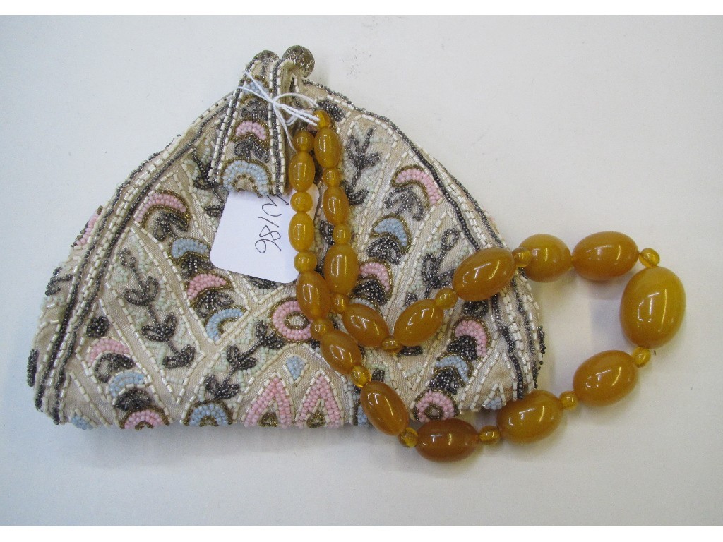 Appraisal: Lot comprising cocktail purse and a string of beads