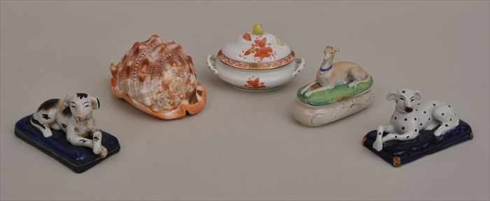 Appraisal: TWO STAFFORDSHIRE RECUMBENT DOG FIGURES Together with a Herend porcelain