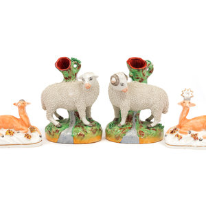 Appraisal: A Group of Four Staffordshire Figures comprising two sheep and