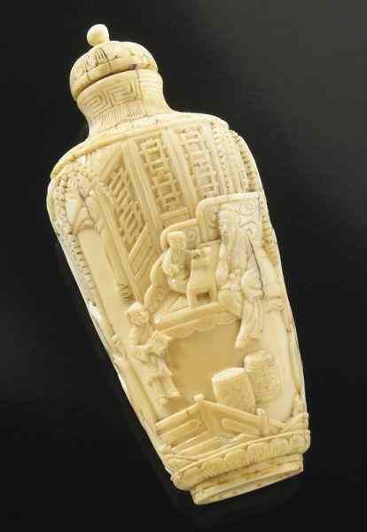 Appraisal: Chinese Qing carved ivory snuff bottle International buyers should note