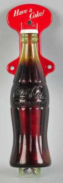 Appraisal: Metal Plastic Coca-Cola Door Pull s Strong overall condition with