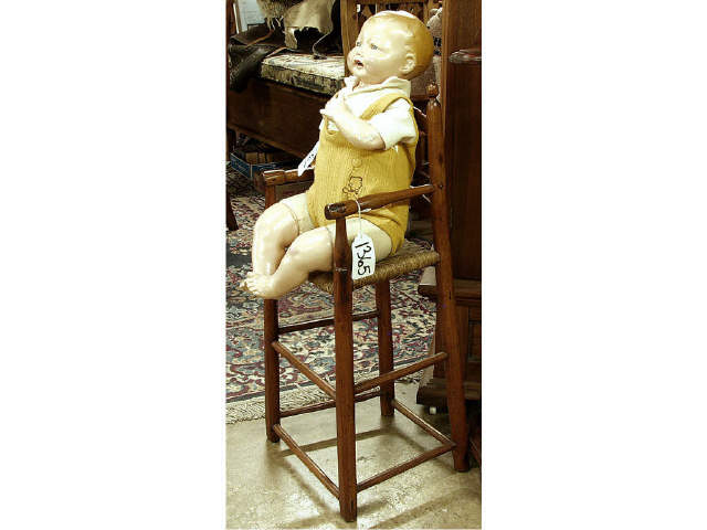 Appraisal: Early American ladder back child's high chair hand hewn and