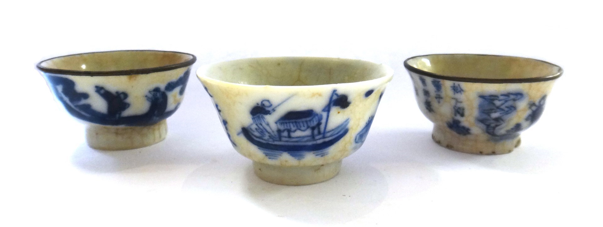 Appraisal: A group of three Chinese miniature blue and white teabowls