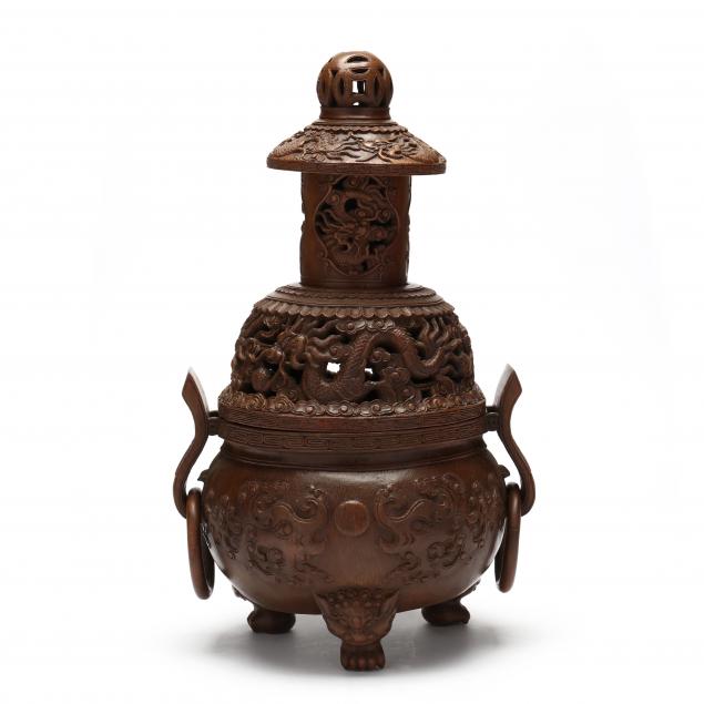 Appraisal: A CHINESE CARVED BAMBOO TIERED INCENSE BURNER th century a