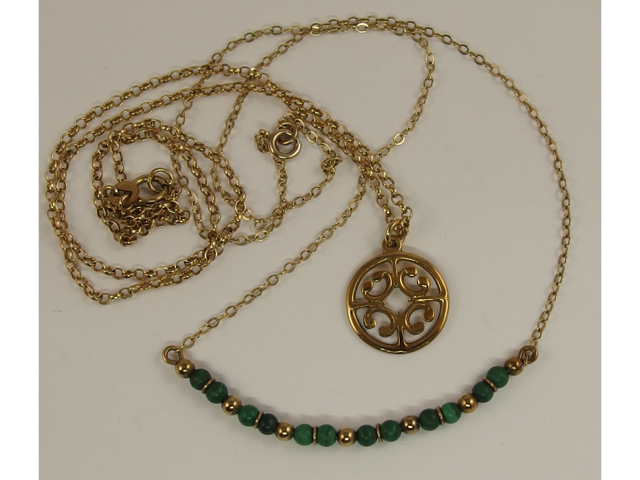 Appraisal: A ct Ola Gorie pendant and chain and a ct