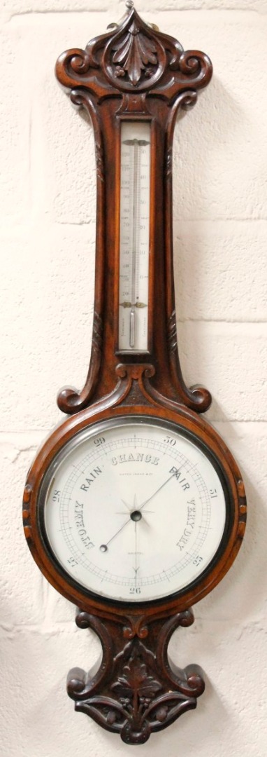 Appraisal: A thC walnut cased two dial banjo barometer of cm