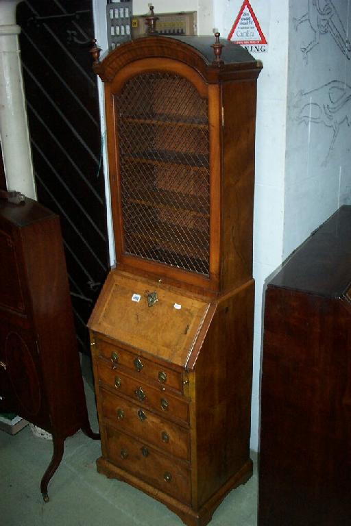 Appraisal: A half-size Queen Anne style walnut and figured walnut bureau