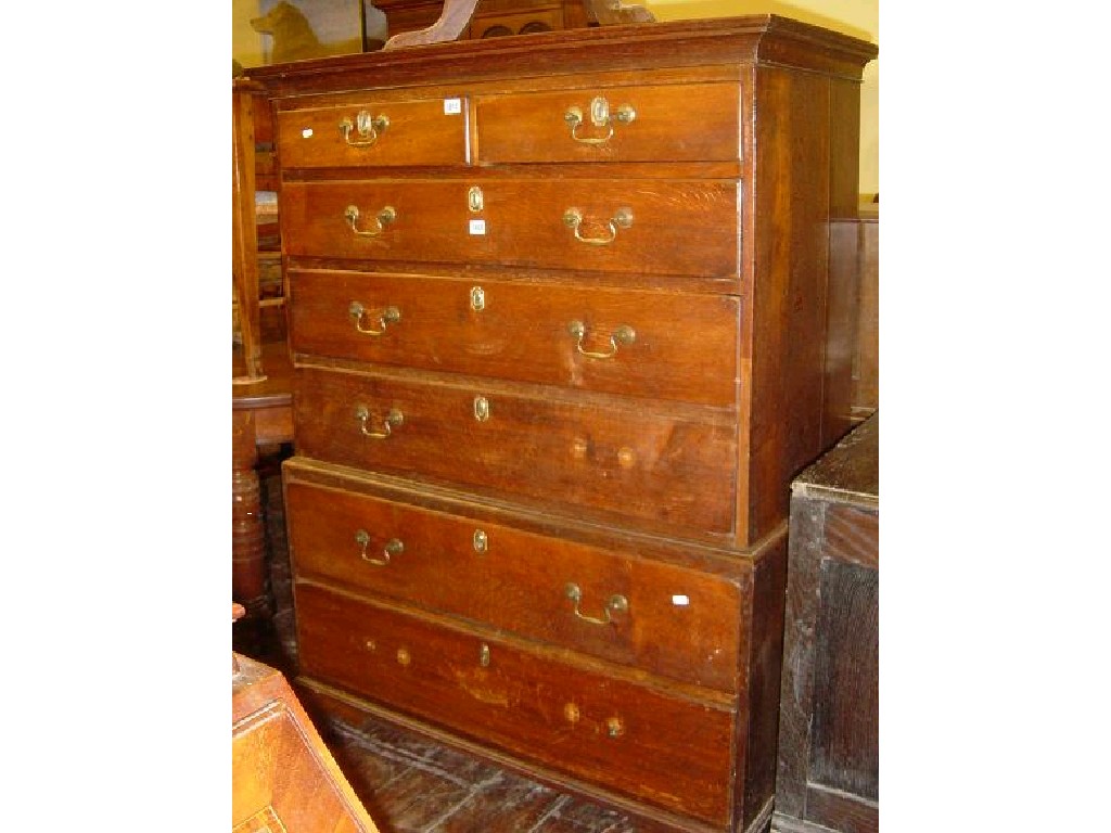 Appraisal: A Georgian oak chest on chest fitted with an arrangement